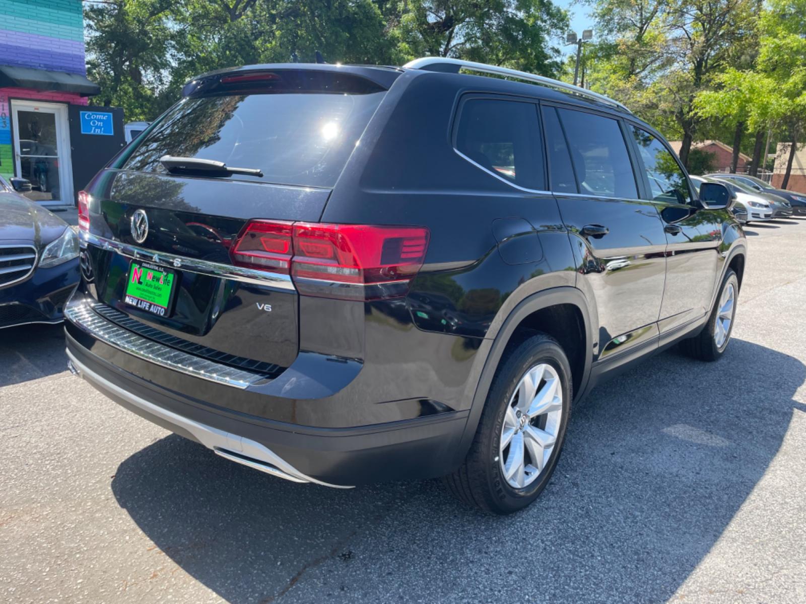 2019 BLACK VOLKSWAGEN ATLAS V6 SE (1V2DR2CA0KC) with an 3.6L engine, Automatic transmission, located at 5103 Dorchester Rd., Charleston, SC, 29418-5607, (843) 767-1122, 36.245171, -115.228050 - Local Trade-in with Leather, Third Row, Backup Camera, AUX/Bluetooth/USB, Dual Climate Control, Power Everything (windows, locks, seats, mirrors), Heated Seats, Rear In-door Sunshades, Push Button Start, Keyless Entry, Alloy Wheels. 121k miles Located at New Life Auto Sales! 2023 WINNER for Post & - Photo #6